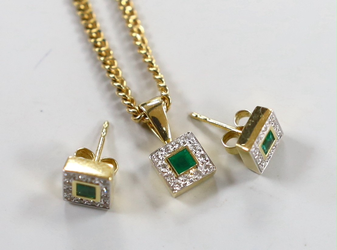 A modern 18ct gold, emerald and diamond set square cluster pendant, 7mm and a pair of matching ear studs, gross weight 4.6 grams, the pendant with an associated 9ct chain, 50cm, 8.6 grams.